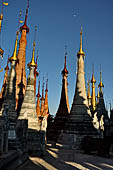 Inle Lake Myanmar. Indein, on the summit of a hill the  Shwe Inn Thein Paya a cluster of hundreds of ancient stupas. Many of them are ruined and overgrown with bushes.